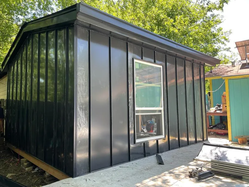 Black standing seam metal wall panels for Metal Roof Installation in Lake Worth Beach