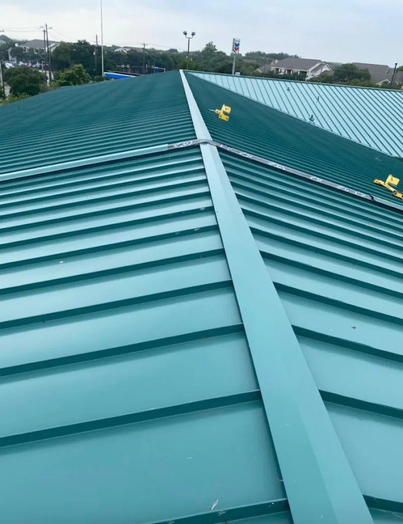 Green commercial metal roof ridge and valley for Metal Roof Repair in Lake Worth Beach